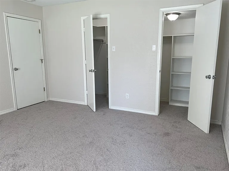 Two closets in the primary bedrooms