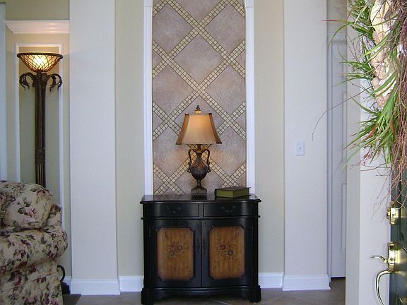 Custom Tile Foyer and Barrel Ceiling