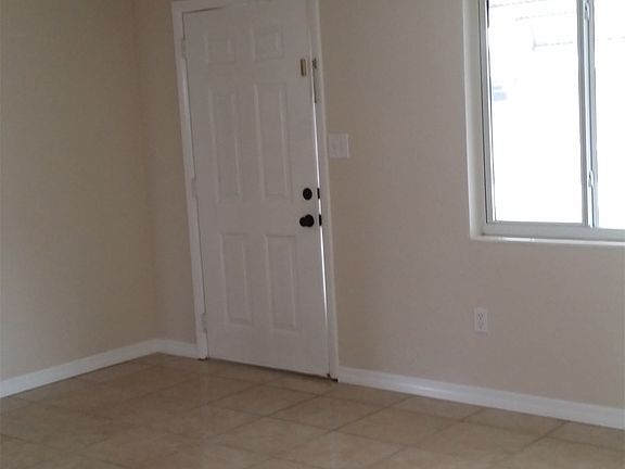 living room/front door from kitchen