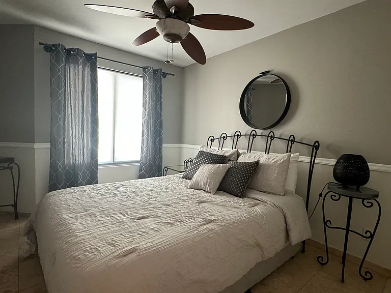 FURNISHED. 1st. Guestroom, queen size bed, walk-in closet. Room for a desk/chair set.