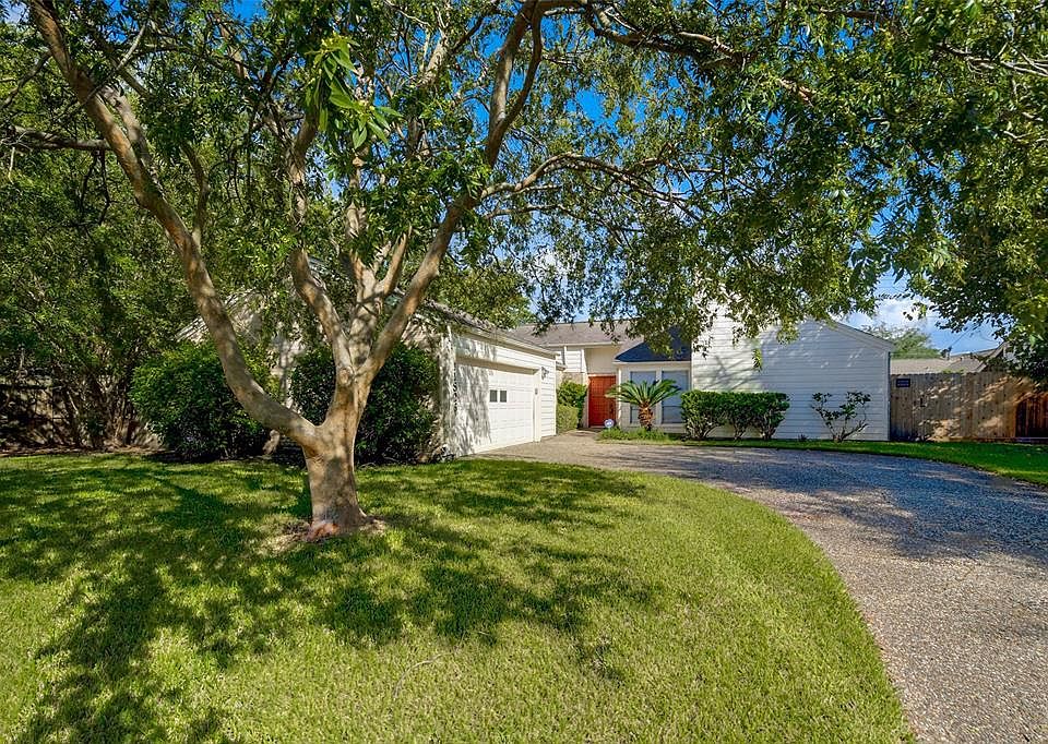 Welcome home to 11826 Poplar Creek Dr! This home is nestled at the end of a quiet culdesac surrounded by mature trees.