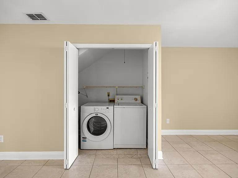 View of the laundry room and washer and dryer(included).