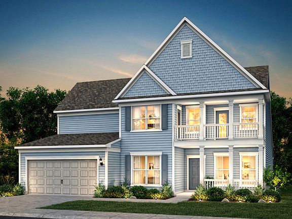 Vanderbilt New Home Exterior 53 with shake accent and a two story porch.