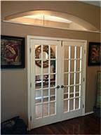 Directly in entry is a study to your right with french doors and wood flooring