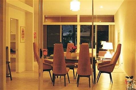 Night photo from one of the patios through to the dining roo