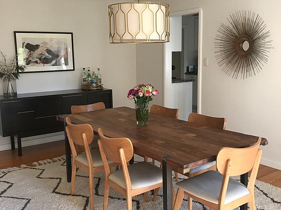 Dining room with French doors that open. Gets a ton of beautiful natural light.