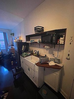 2nd image of 204 E 7th St APT 11