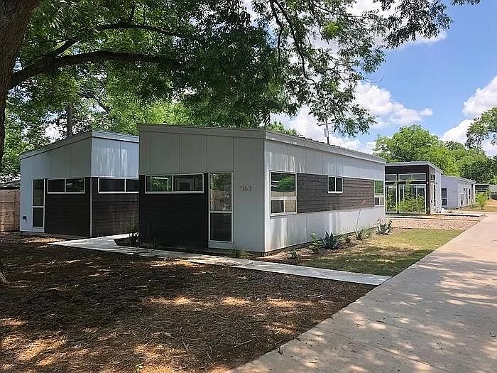 Front of six unit complex. Unit is at end of private drive for maximum privacy.