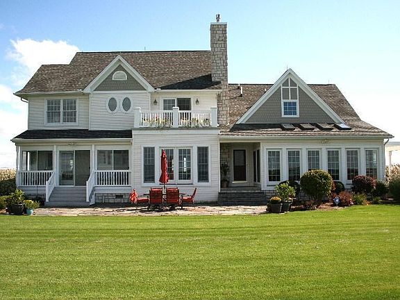 Front View with Multi Patio's and Enclosed Porches
