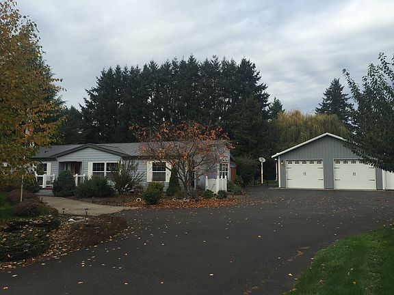 Front of house & 4car garage