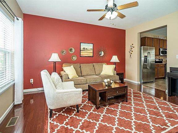 Formal Living Room with hardwood flooring could also be used as a Dining Room.