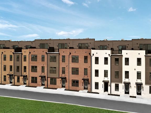 Exterior view of row of townhomes including the Rockland at Locke Landing in Baltimore, MD featuring