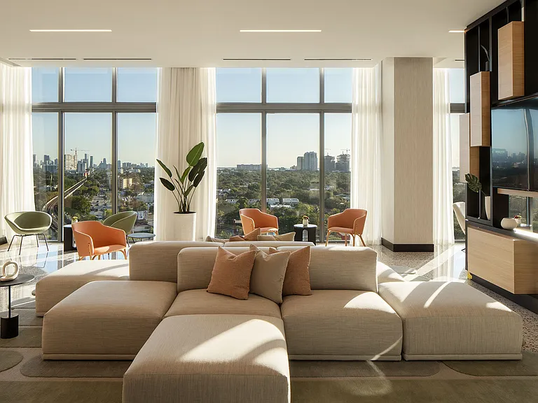 Experience our social club with comfortable seating to foster community connections