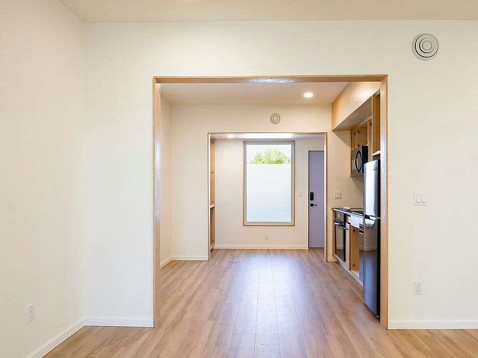 Window coverings provided throughout for privacy and light control