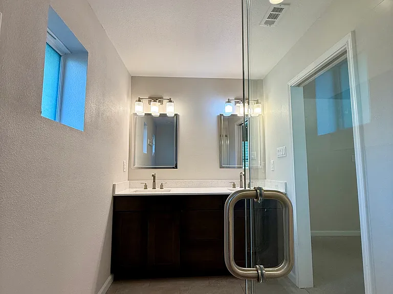 Primary bathroom dual sinks.