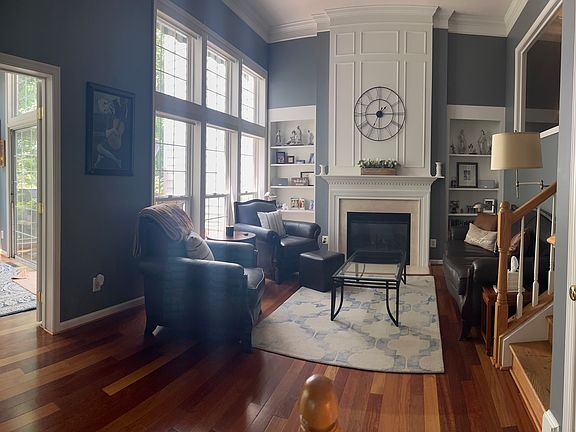Living Room #1- Main Floor (entry to Sunroom and Stairs to Office/Dining/Kitchen)