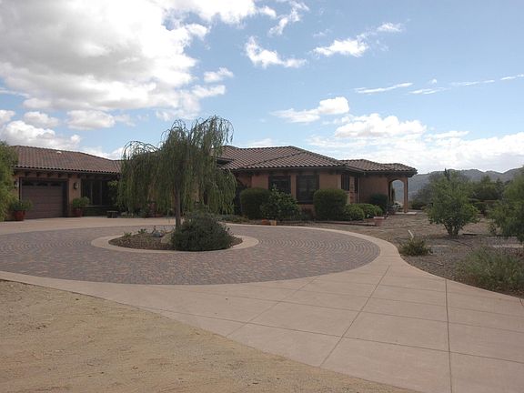 Large circular driveway for easy access.