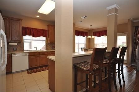 The open kitchen den is ideal for the chef in the family.