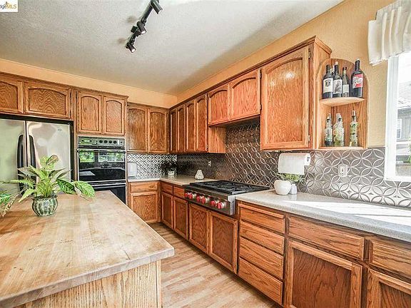 KITCHEN UPGRADES WITH 6 BURNER WOLF STOVE