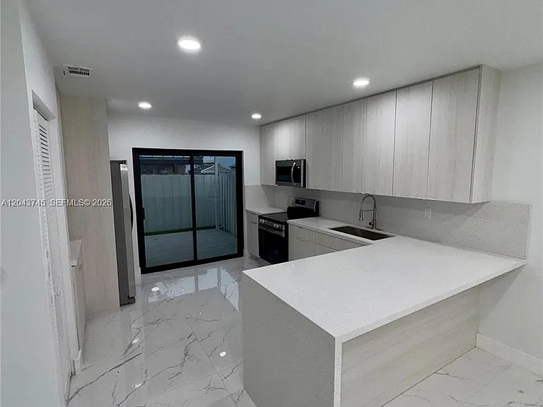 8945 NW 114th St — Photo 9