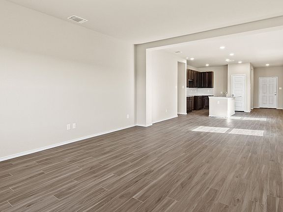 Family Room to Dining and Kitchen