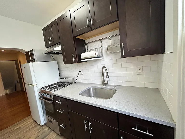 Kitchen with cabinets & appliances