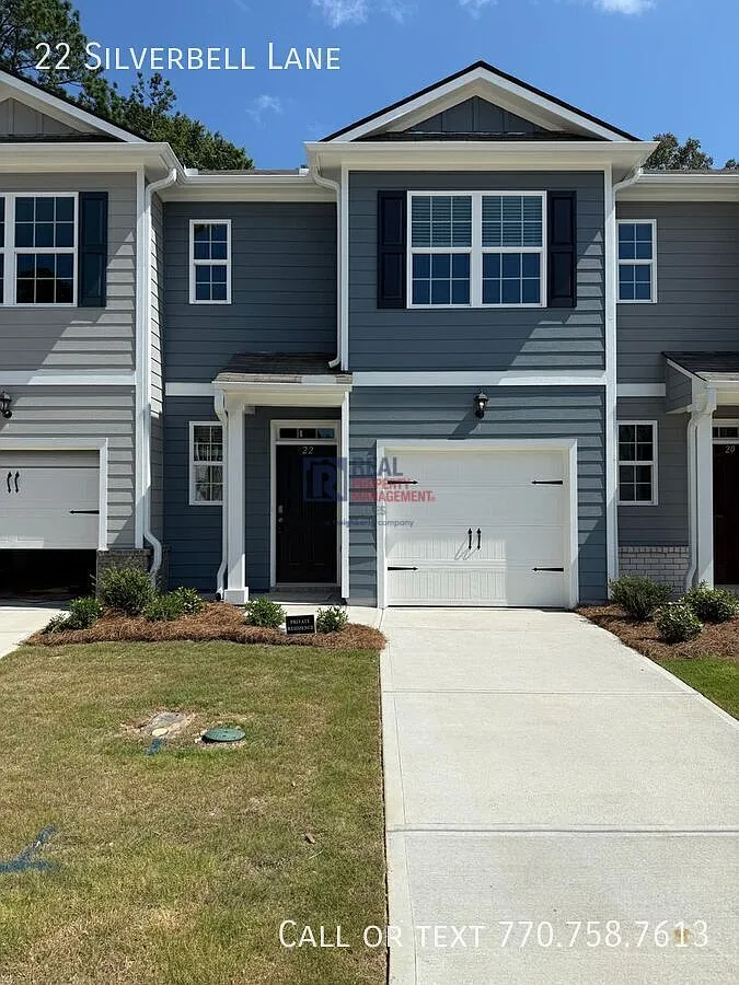 New Townhome Close to It All — Photo 1