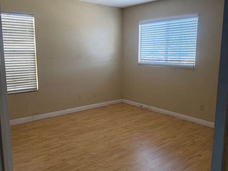 Bedroom with large windows
