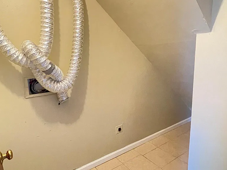 Utility room with washer & dryer hook up