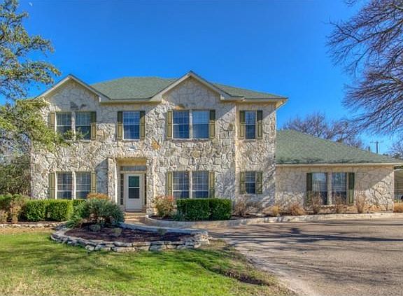 Welcome home to 60 Four T Ranch~Gorgeous 2 story home with side entry garage just minutes from Lake Georgetown