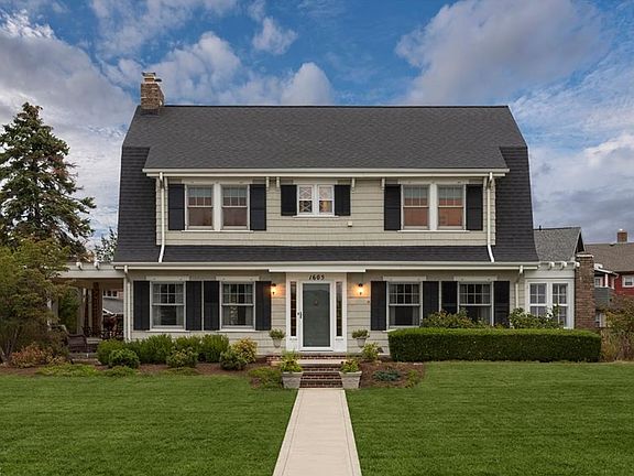 Welcome to 1605 Riverside Drive, a stately Dutch Colonial on 1/3 acre lot.