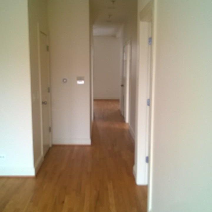 Hallway from spacious Living Area to Bedrooms and Kitchen