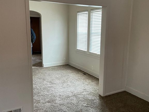 picture taken from living room, looking at dining room