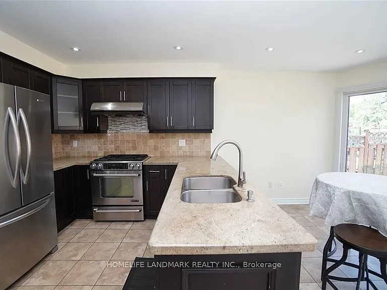 4887 Natkarni Cres — Photo 12