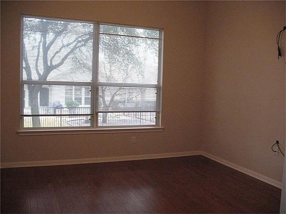 2nd Bedroom or Office with wood floors.