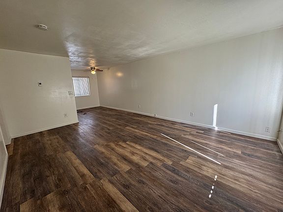 Living room with kitchenette area at top right