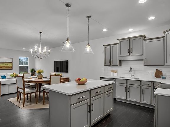 Kitchen with Center Island of the Griffin Model from Garman Builders