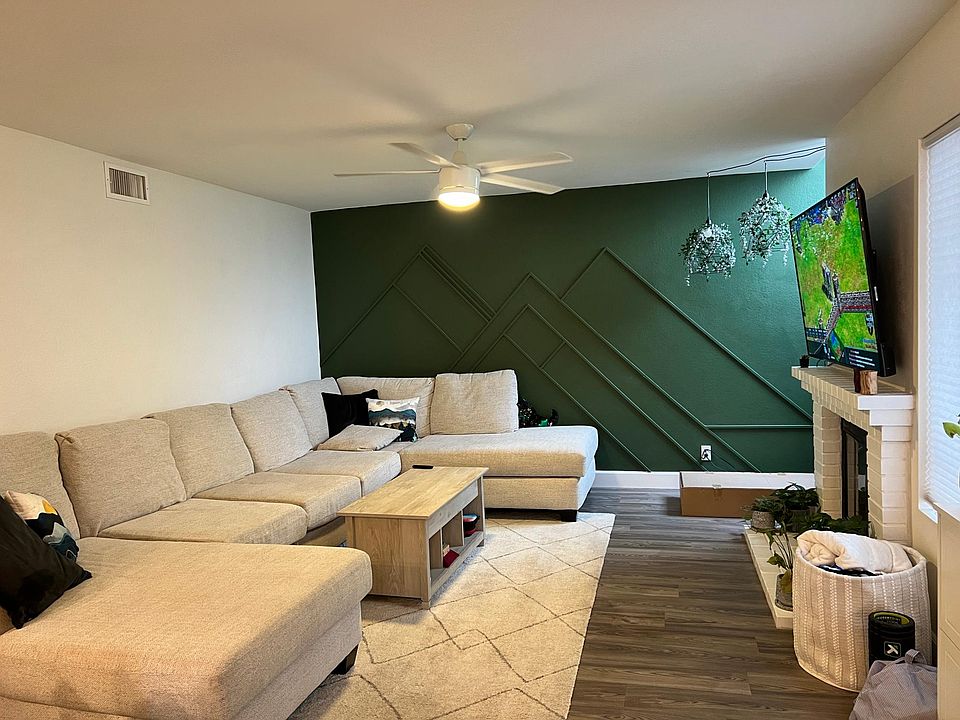 Updated Accent Wall in Living Room - couch may remain if included in rental agreement.