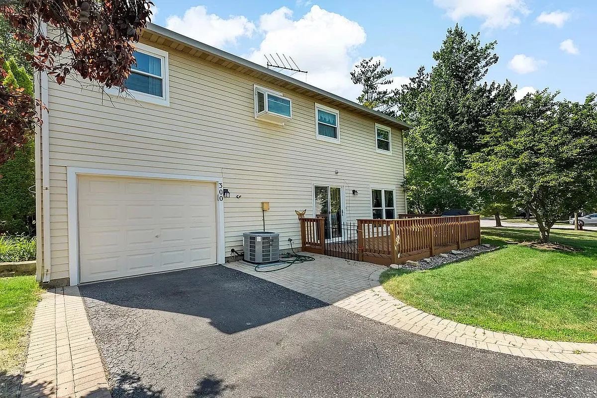 back of the house with deck - 300 Aster Ct