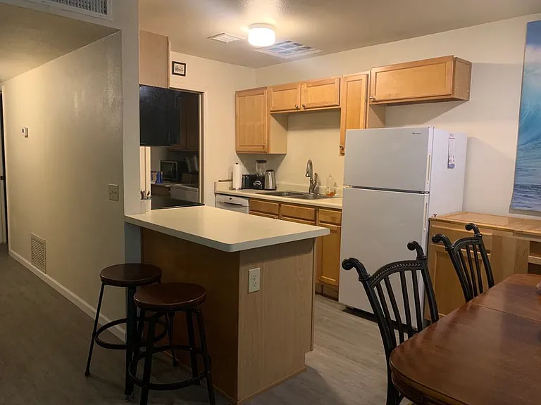 Kitchen and dining areas, laundry room on the far side of the kitchen