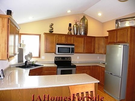 Kitchen featuring granite countertops, large pantry, hickory cabinets with dovetail joints, Astracas