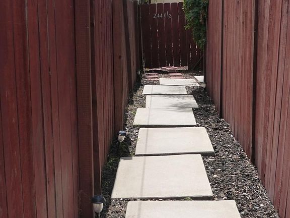 walkway from street entrance to yard entrance