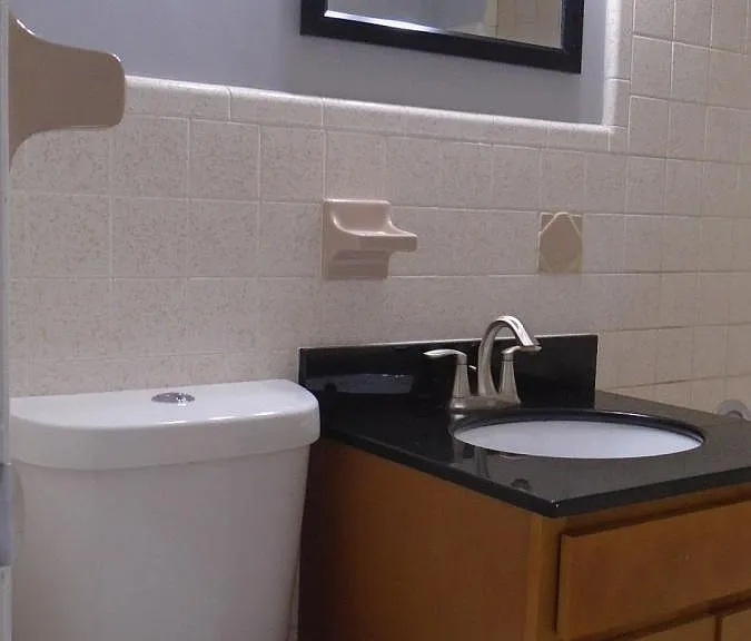 Hallway Bathroom with Dual Flush Toilet