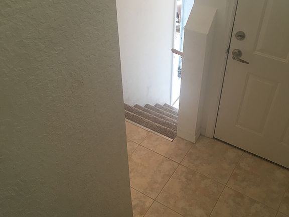 Inside staircase to garage.
