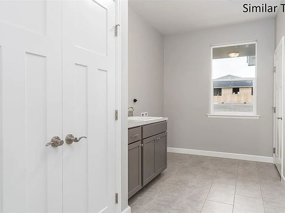 Laundry Room, has 1 year old Samsung Washer/Dryer