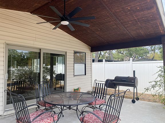 covered back patio facing east, very pleasant in the evenings