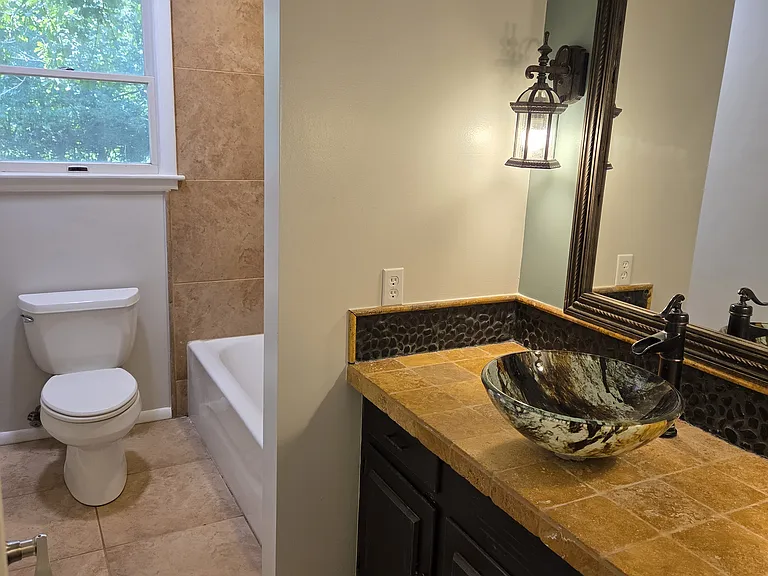 2nd Bathroom featuring vessel sink