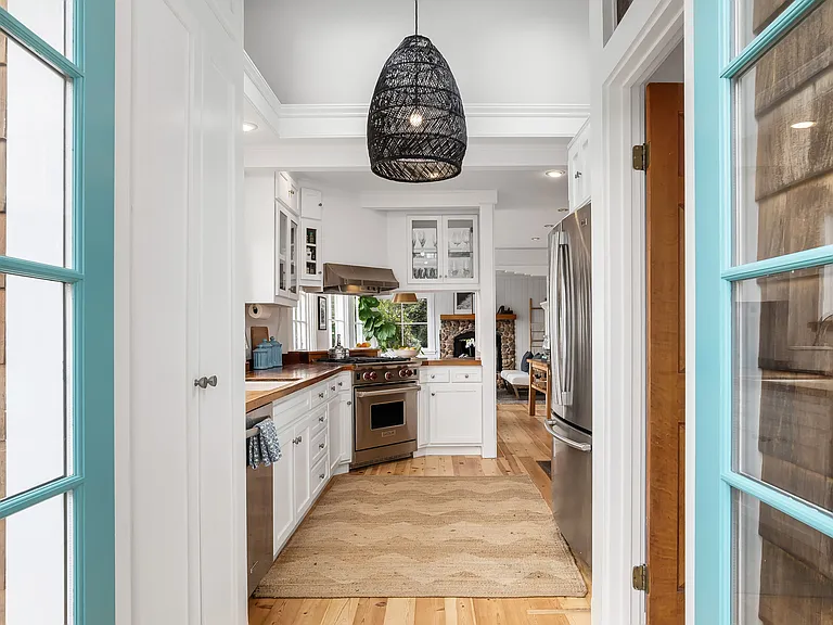 Entrance from the front deck to the kitchen.
