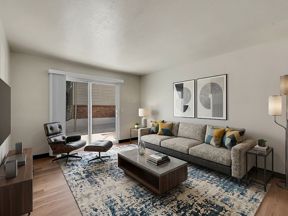 Living Room with sliding glass door to patio or balcony