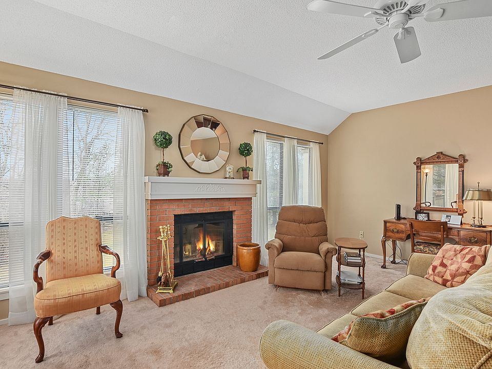 Inviting formal living room with fireplace
